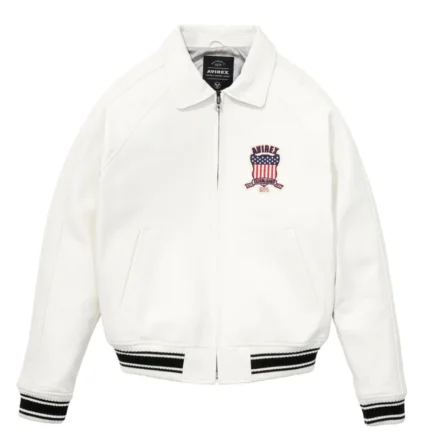 Men’s white leather bomber jacket with AVIREX USA patch, zip front, ribbed cuffs, collar neckline, and varsity aviator style.