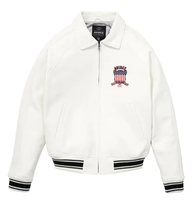 Men’s white leather bomber jacket with AVIREX USA patch, zip front, ribbed cuffs, collar neckline, and varsity aviator style.