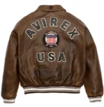 Men’s brown Avirex real leather bomber jacket with Avirex USA back logo, aviation emblem, ribbed cuffs, and American pilot flight style.
