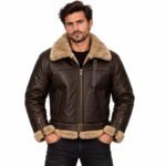 Men's brown sheepskin leather bomber jacket with cream fur collar, cuffs, and hem