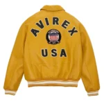 Men’s yellow Avirex leather bomber jacket with Avirex USA back logo, aviation emblem, ribbed cuffs, and American pilot flight style.