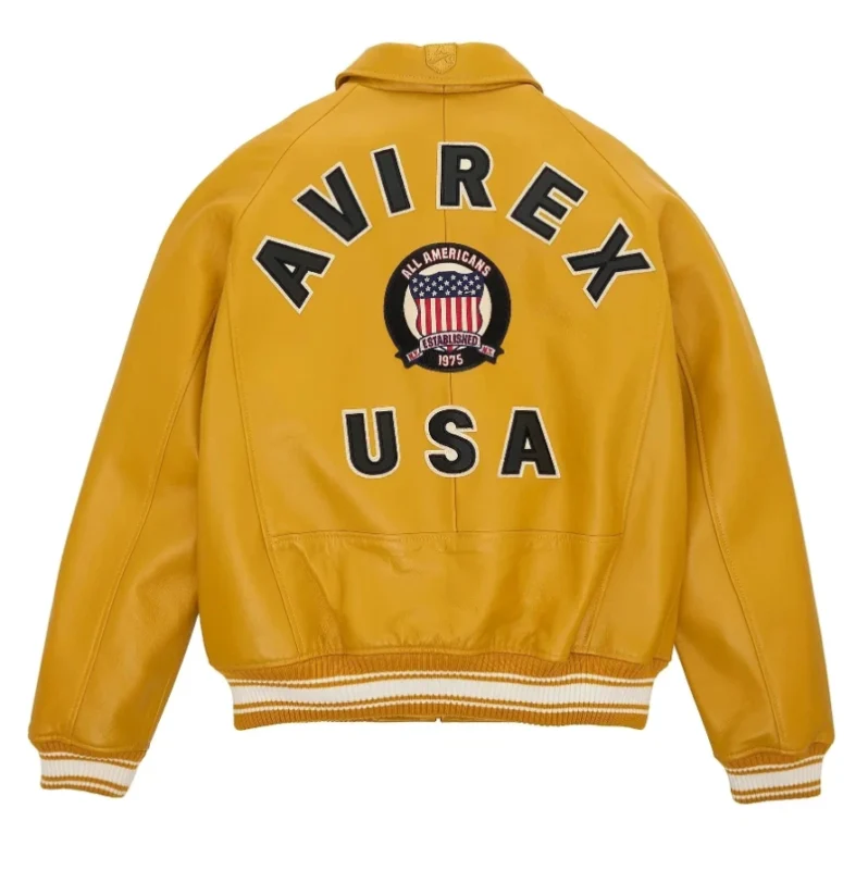 Men’s yellow Avirex leather bomber jacket with Avirex USA back logo, aviation emblem, ribbed cuffs, and American pilot flight style.