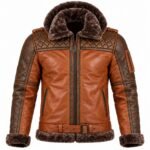 Brown leather jacket with dark fur collar, quilted shoulder detailing, front zipper, and adjustable waist belt