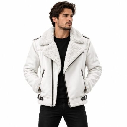 White shearling leather jacket with plush fleece collar and cuffs, diagonal zipper, zip pockets, shoulder details and black hardware on a clean white background.