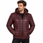 Man wearing the VOLT Red Puffer Jacket with raised collar, horizontal quilted panels, full front zipper, and practical zippered pockets against a white background.