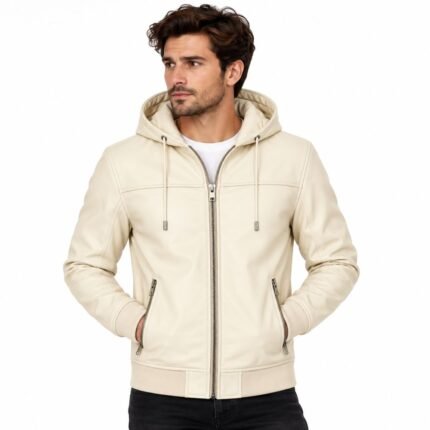 Man wearing a cream hooded leather jacket with full front zipper, drawstring hood, zippered pockets, and ribbed cuffs
