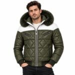 Man wearing the Olive Haven Quilted Fur Hood Jacket with olive quilted panels, contrasting white shoulder yoke, fur-trimmed hood, zippered pockets, and ribbed cuffs against a white background.