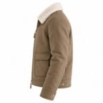 HAVOC brown leather shearling jacket showing its side construction, plush cream collar, long sleeve stitching, flap pocket, front zipper, and adjustable cuff detail.