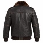 Black leather bomber jacket with zippered sleeve pocket, shoulder tabs, and detailed stitching