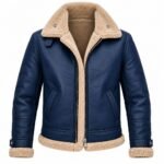 Navy blue shearling leather jacket with a cream shearling collar, silver front zipper, angled pockets, stitched panels, and shearling-lined cuffs and hem.