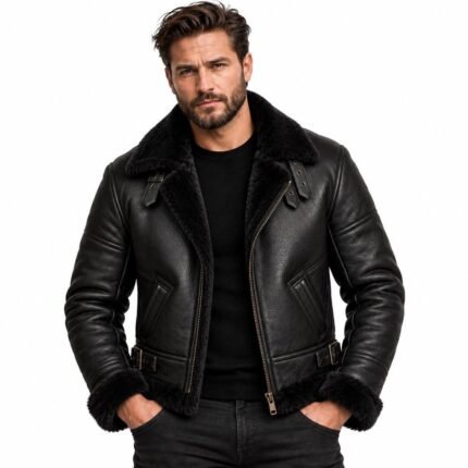 Obsidian black shearling jacket with a plush shearling collar, smooth leather finish, metal zipper, angled pockets and structured detailing.