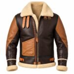 Brown leather bomber jacket with structured back, cream fur trim, and waist straps